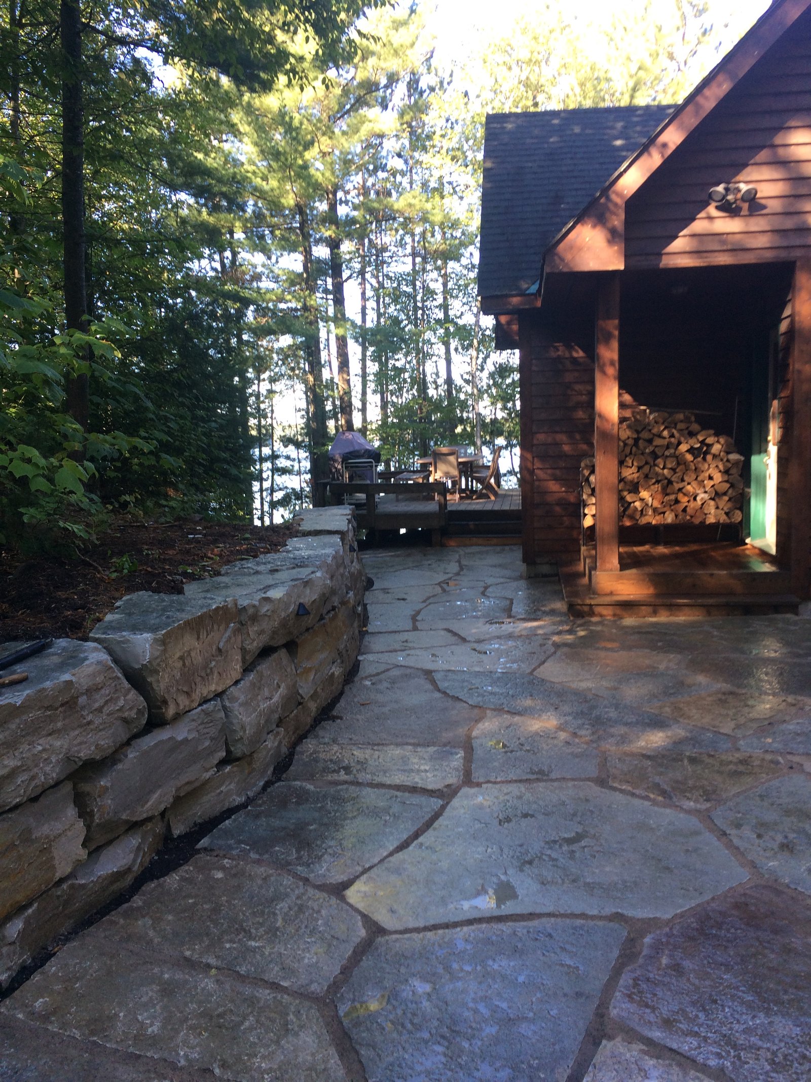 Flagstone path and armour stone by Thor Construction