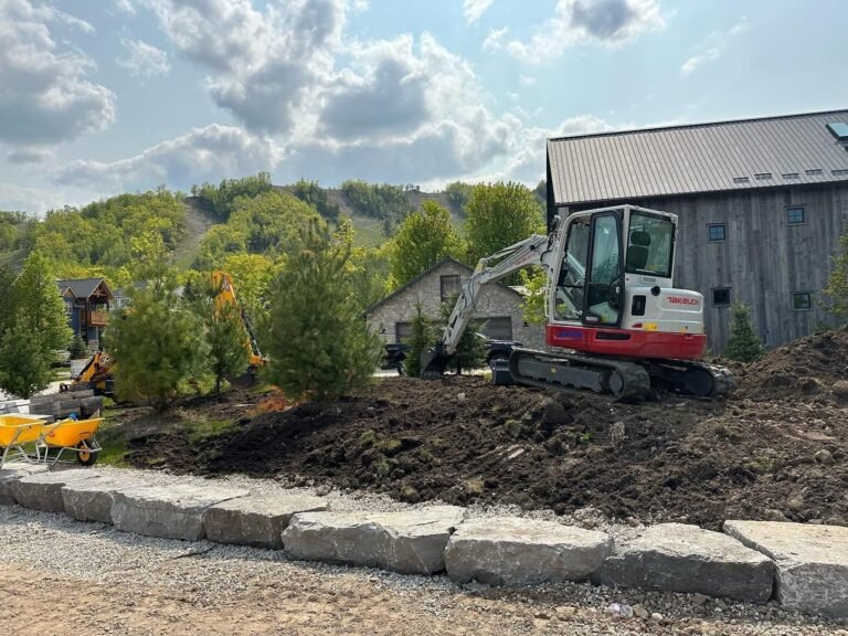 Armour stone garden edge. Thor Construction job photo.