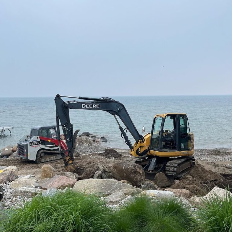 Shoreline drainage and wall repair. Thor Construction job photo.