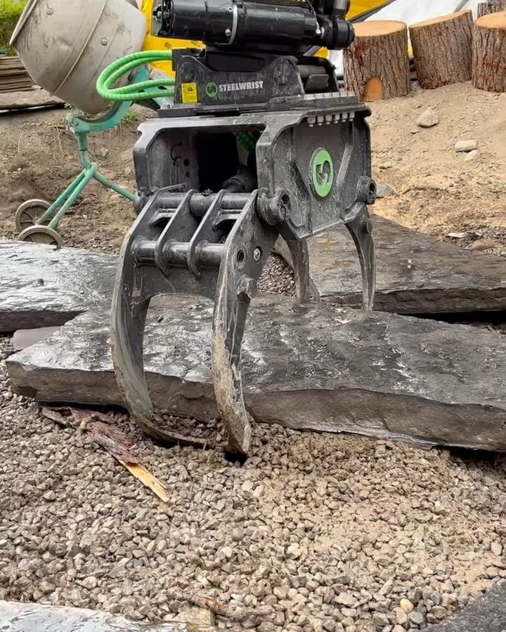 Laying out jumbo flagstone. Thor Construction job video.