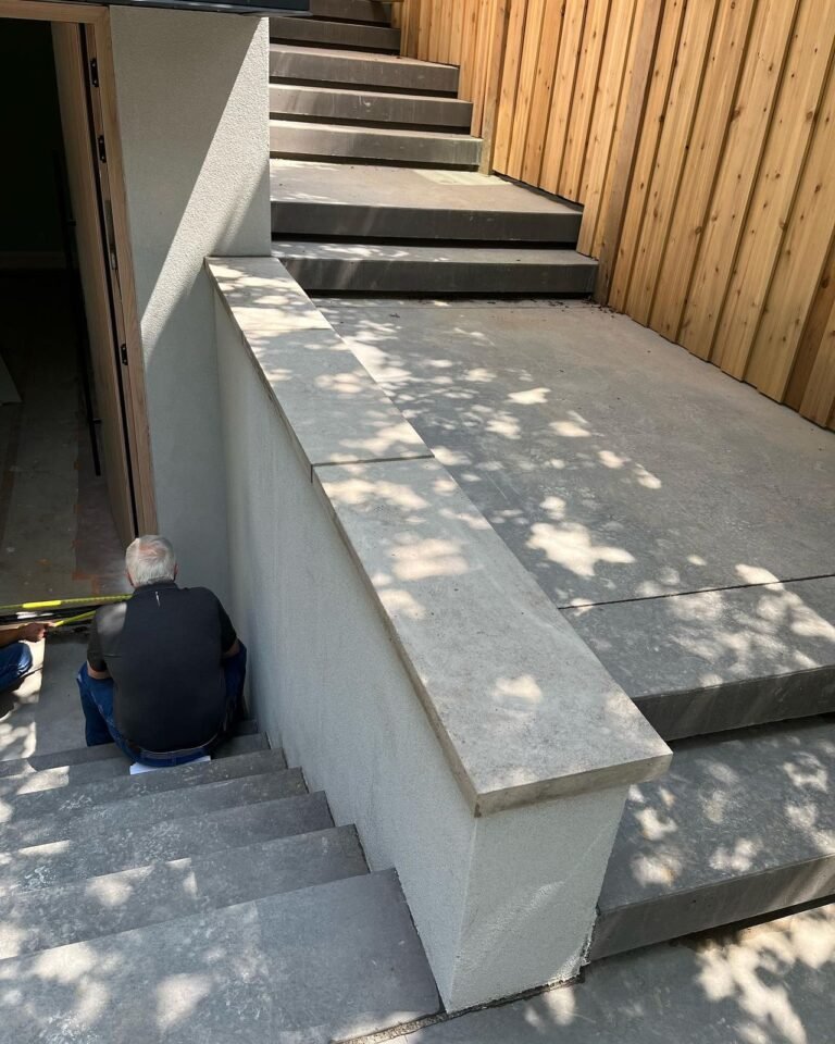 Stone copings and a flagstone porch. Thor Construction job photo.