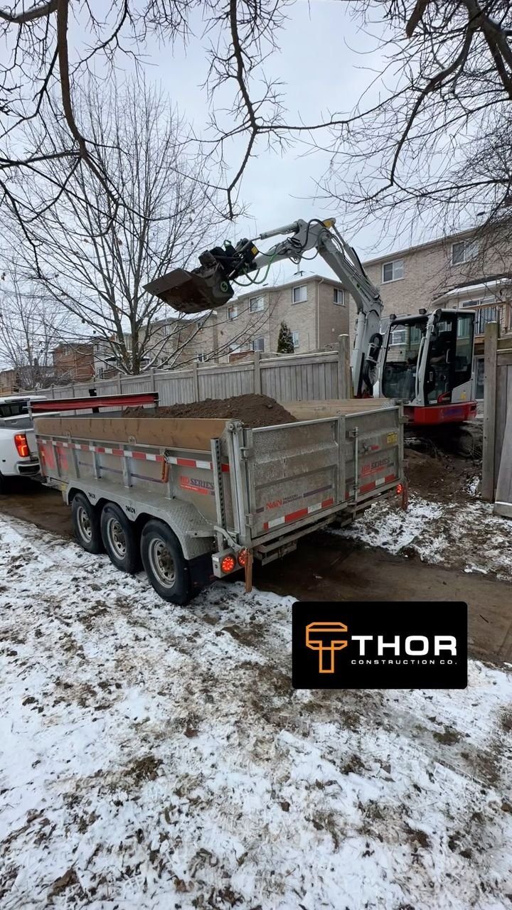 Still digging in the snow. Thor Construction job video.