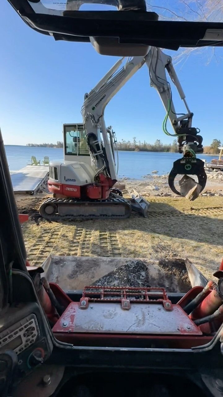 Shoreline tear-out and rebuild on Pigeon Lake, Bobcaygeon. Thor Construction job video.