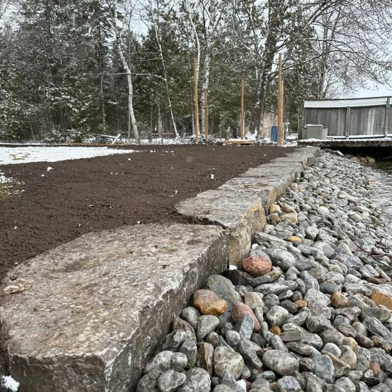 Shoreline rebuild on Pigeon Lake, before and after, Bobcaygeon. Thor Construction job photo.