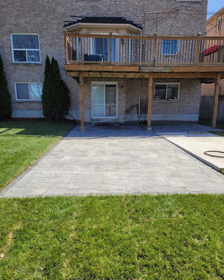 Hardscape pad for a swim spa, Barrie. Thor Construction job photo.