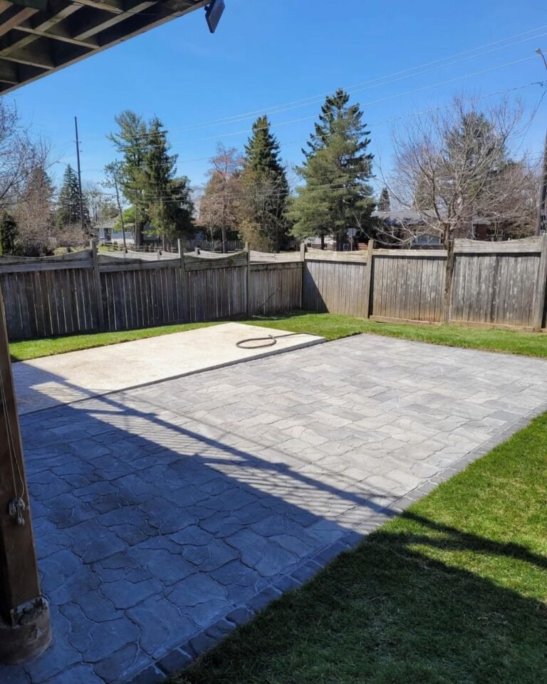 Hardscape pad for a swim spa, Barrie. Thor Construction job photo.