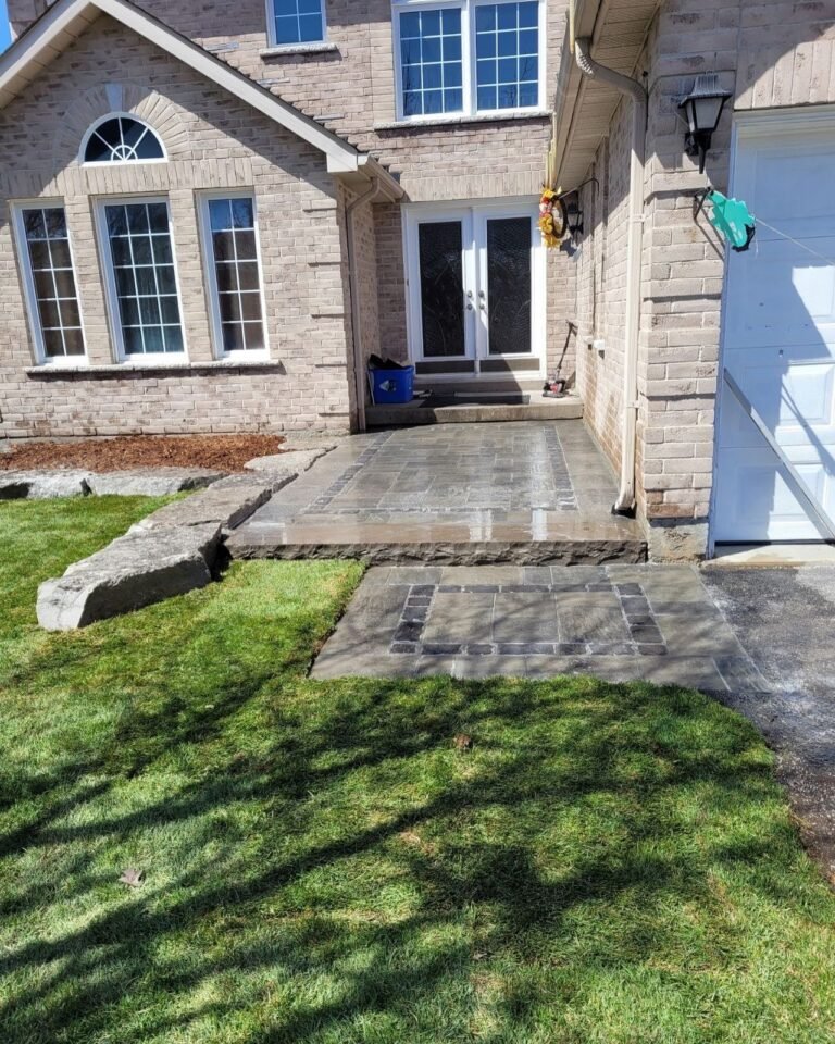 Front yard refresh with a stone walkway. Thor Construction job photo.