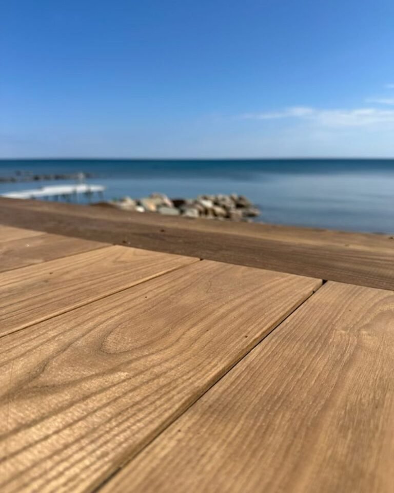 Thermally modified decking by the water. Thor Construction job photo.
