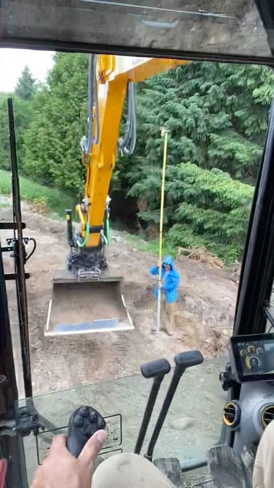 Working on a septic base cut. Thor Construction job video.