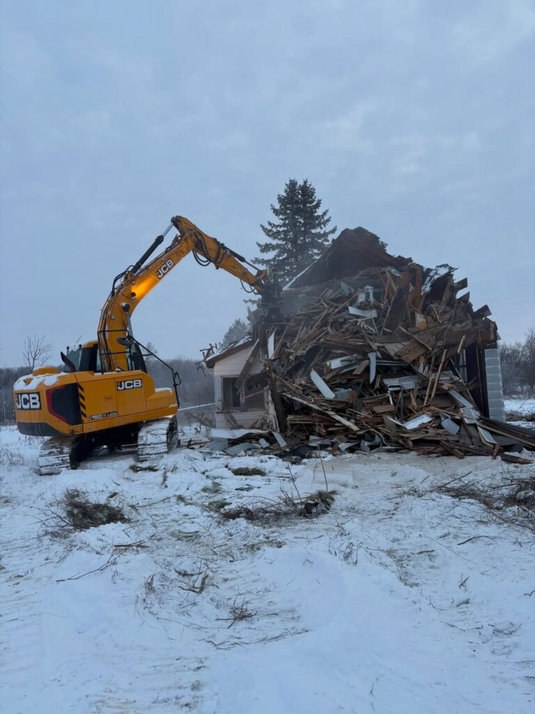 House demolition in the snow, Peterborough. Thor Construction job photo.