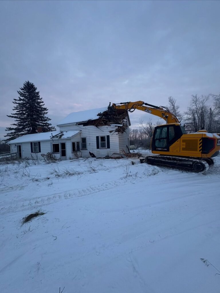 House demolition in the snow, Peterborough. Thor Construction job photo.