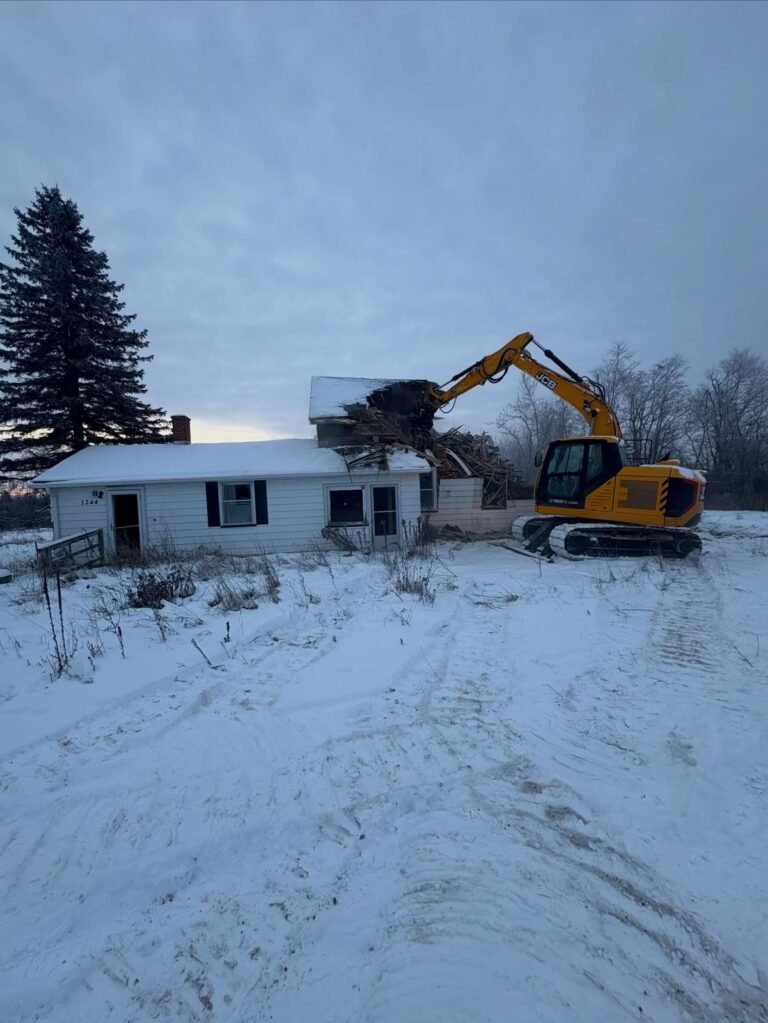 House demolition in the snow, Peterborough. Thor Construction job photo.