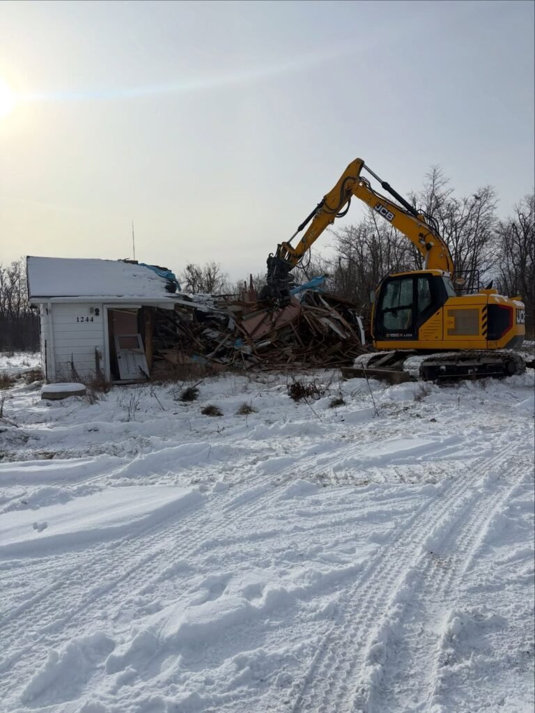 House demolition in the snow, Peterborough. Thor Construction job photo.