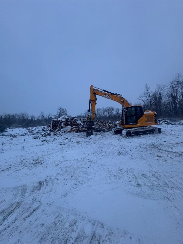 House demolition in the snow, Peterborough. Thor Construction job photo.