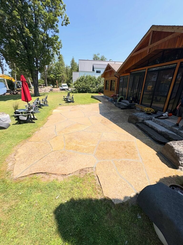 Jumbo flagstone patio, still sharp years later, Bobcaygeon. Thor Construction job photo.