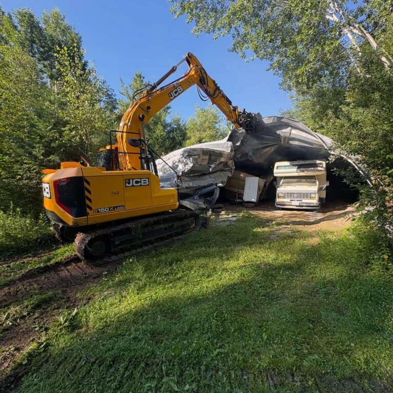 Taking down a collapsed quonset hut. Thor Construction job photo.
